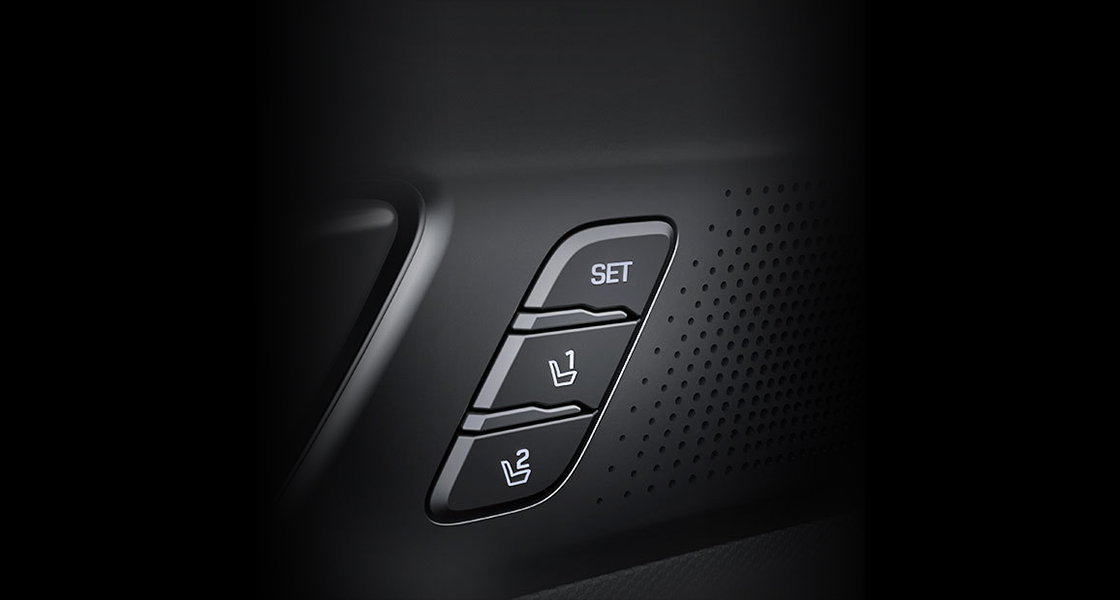 Integrated memory seat control buttons