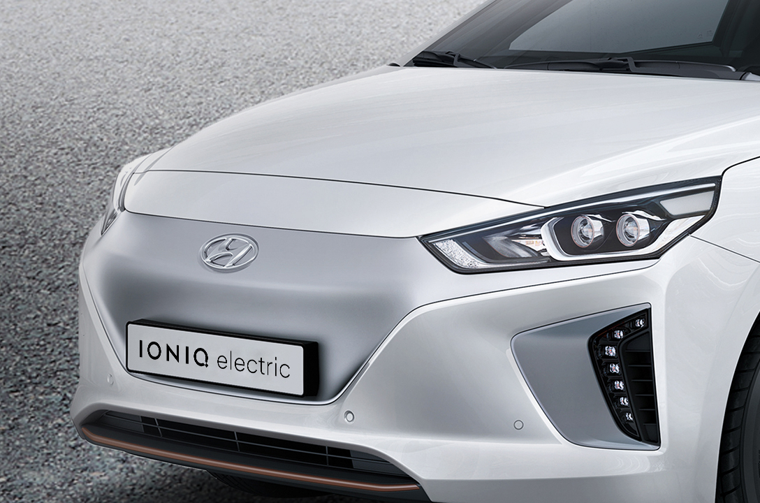 Closer view of side front part of white Ioniq Electric