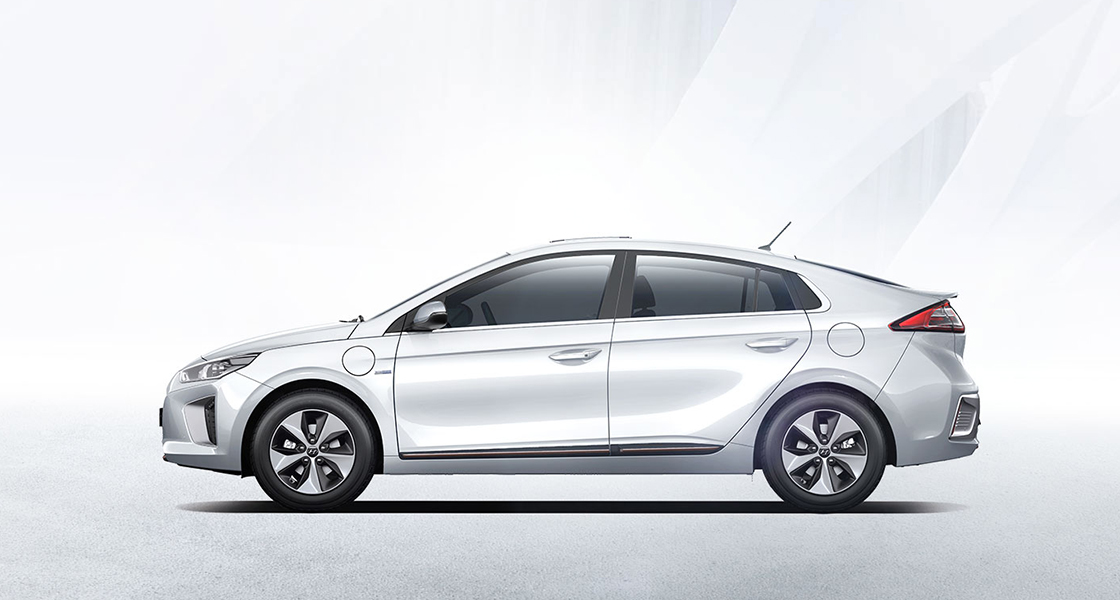 Side view of white Ioniq Electric with white background